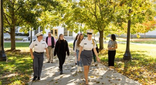 Norwich students leading campus tour.