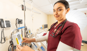 Nursing student working in the nursing labs.