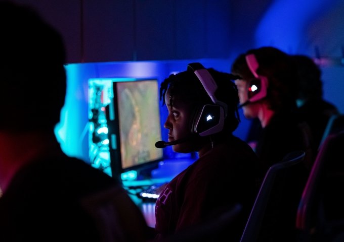 Students in the Norwich University "War Room" on computers.