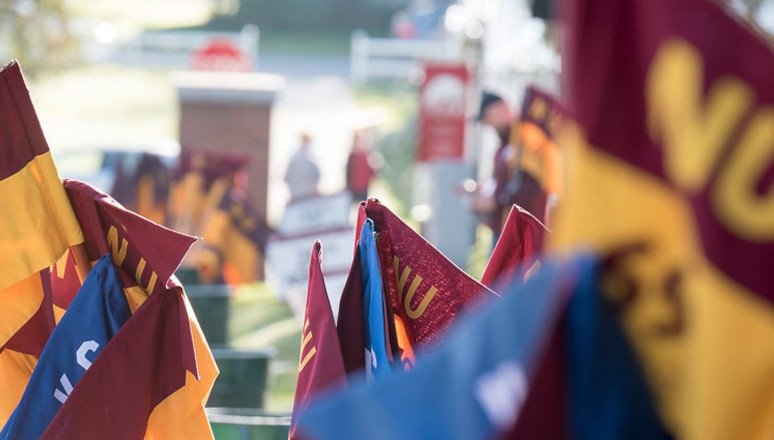 Homecoming guidons before Alumni Parade start