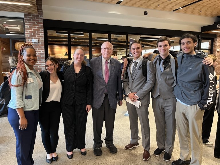 Associate Director and Peace and War Center Chair, Professor Yangmo Ku, along with six Norwich University students with retired Sen. Patrick Leahy (D-VT) 