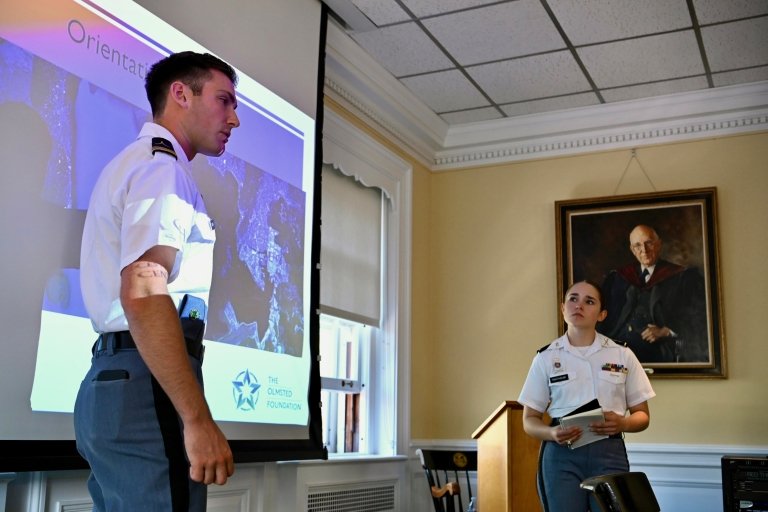 Regimental Commander Sophia Righthouse ’25 and Cadet Wil Bazant ‘25 presenting a comprehensive briefing about the expedition to the Philippines to COL Elfendahl, LtGen Broadmeadow ’83, and Dr. Morris