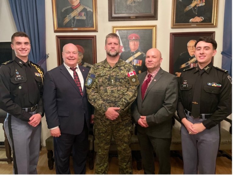 Norwich University students and Dr. Travis Moore at the International Forum for Peace, Security, and Prosperity (IFPSP)