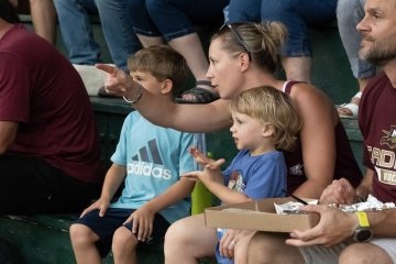 Family in the stands at Norwich Night at the Vermont Mountaineers.